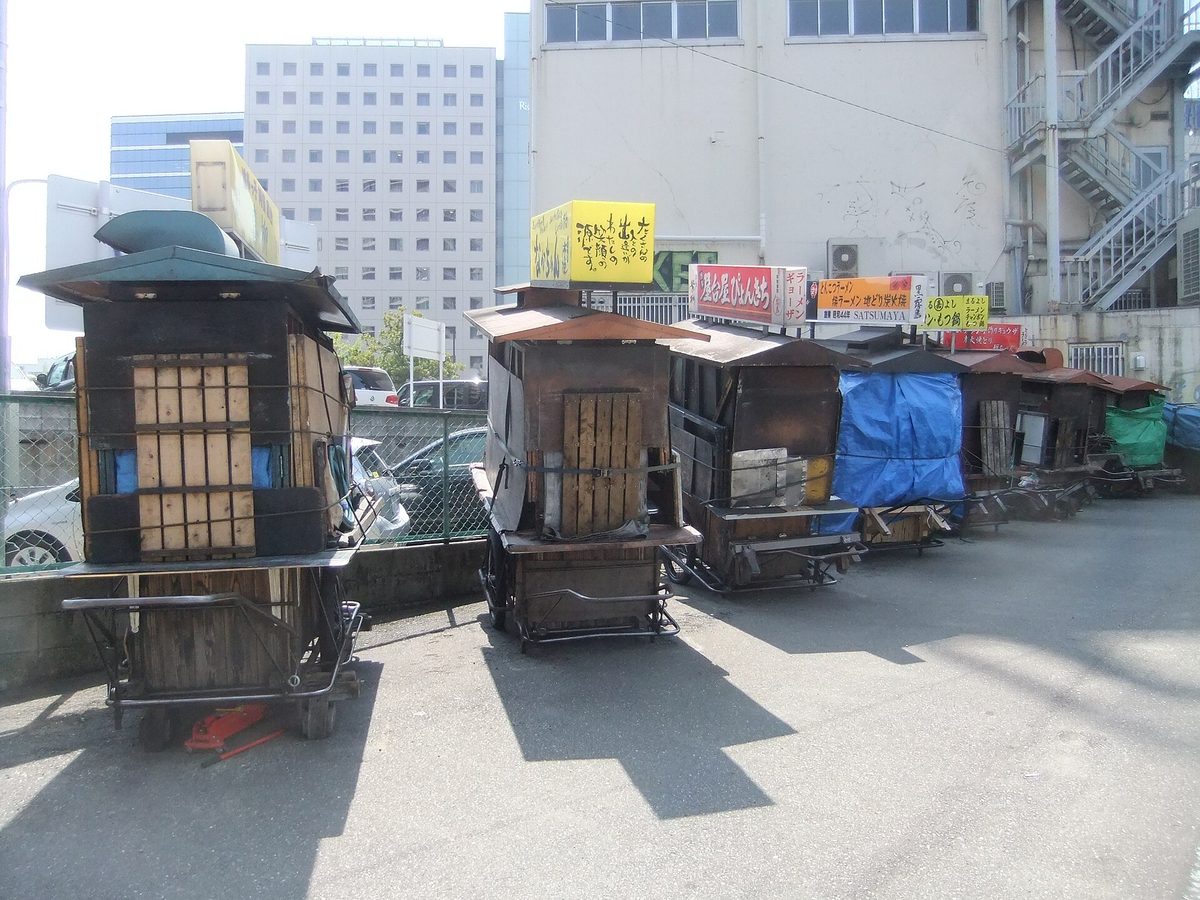 Closed yatai food stall carts parked in a car park in Fukuoka (Fukuoka) during the day