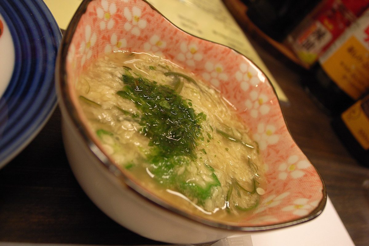 A small bowl of otoshi appetizer at an izakaya