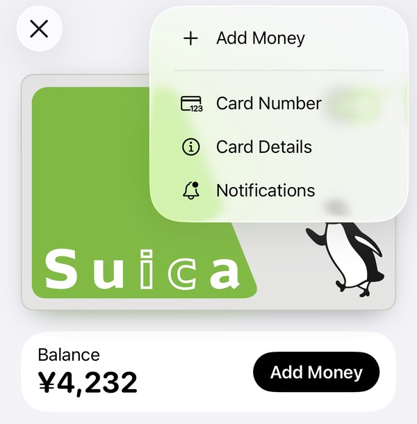 The Suica card in Wallet with its menu open: Add Money, Card Number, Card Details and Notifications, and below it the balance with a black Add Money button