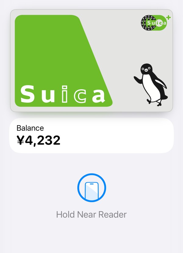 A Suica card in the iPhone Wallet app with its balance in yen and the words Hold Near Reader below an iPhone icon