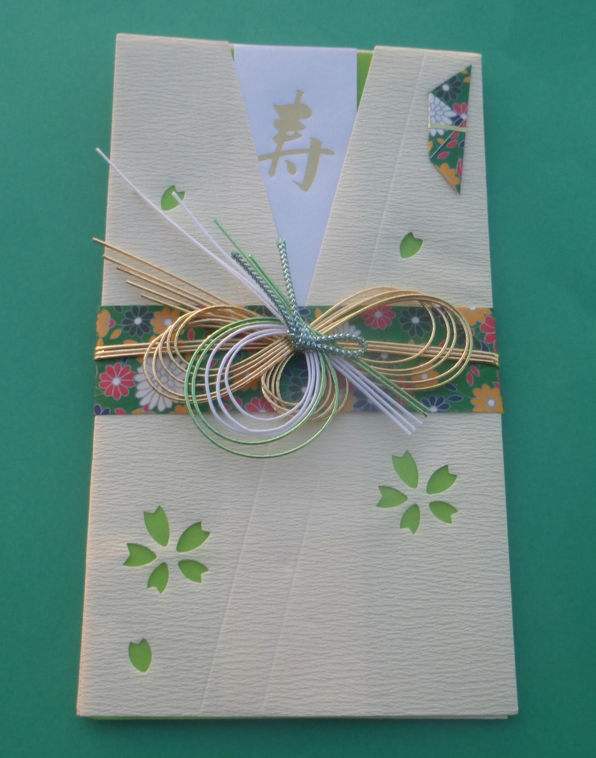 A Japanese gift money envelope for celebrations, tied with gold and silver cords